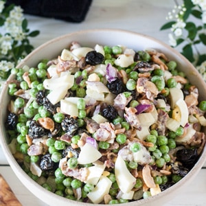 pea salad in beige bowl
