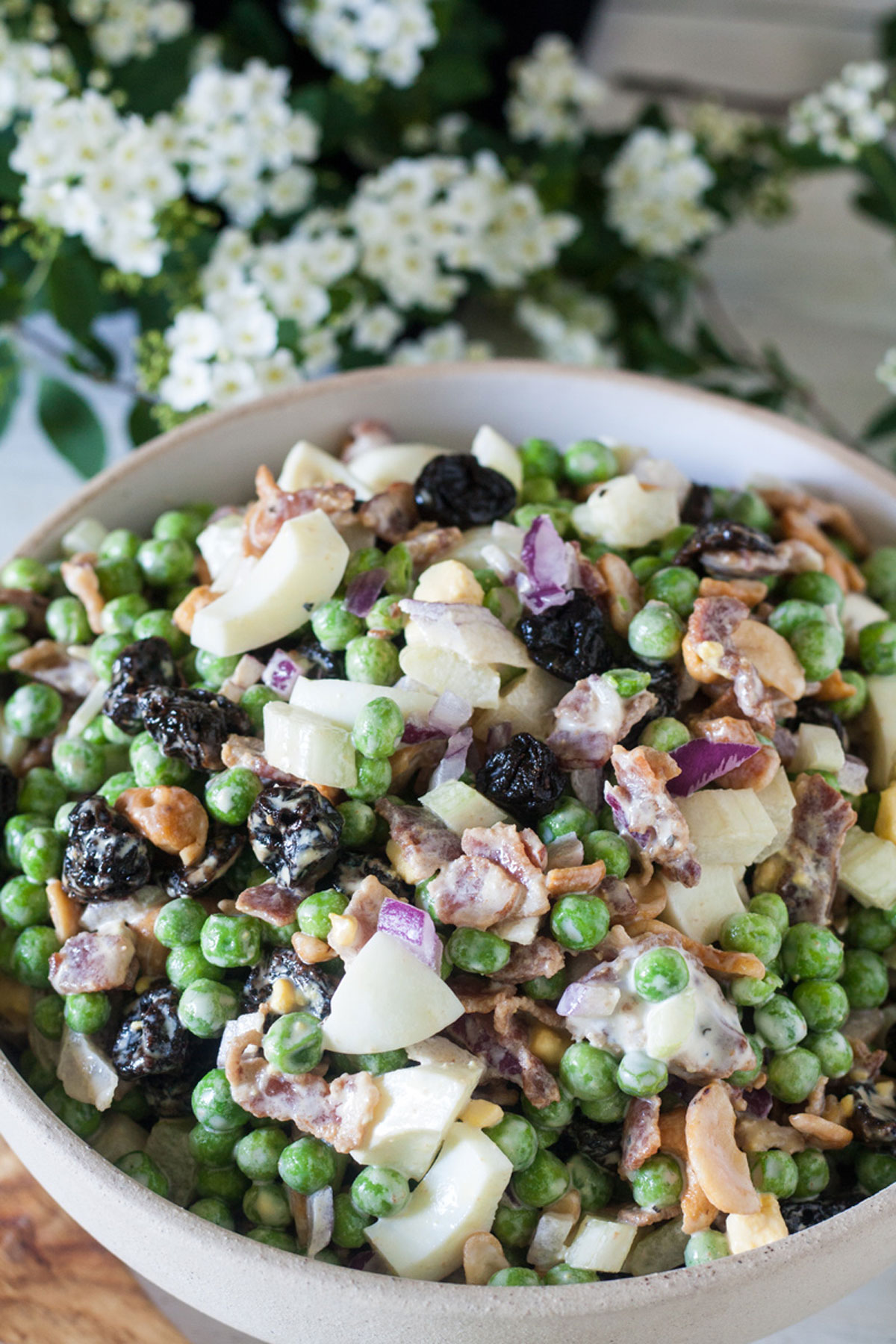 overhead photo of pea salad in a white bowl Overhead photo of pea salad in a white bowl