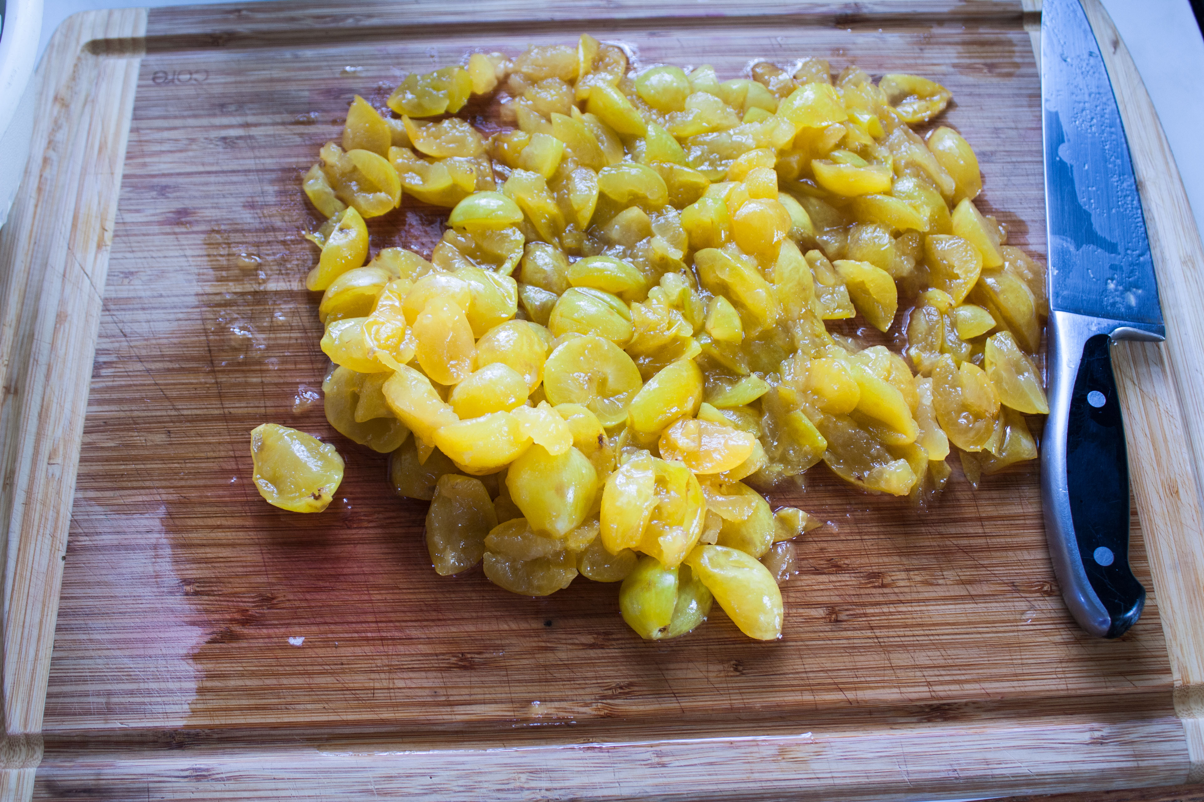 Remove pit. Rough chop the flesh.