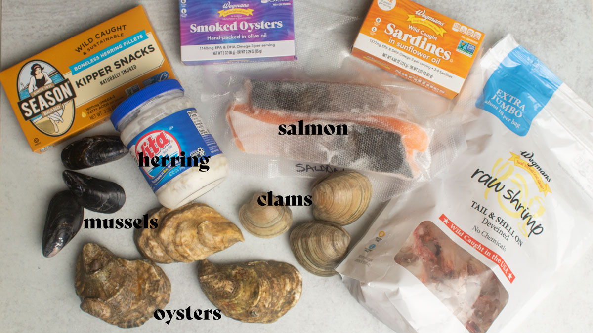Mixed seafood on a white board.