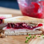 Halved turkey sandwich.