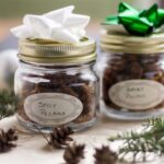 Spicy nuts in a decorative jar with a label and bow on top for gifting.