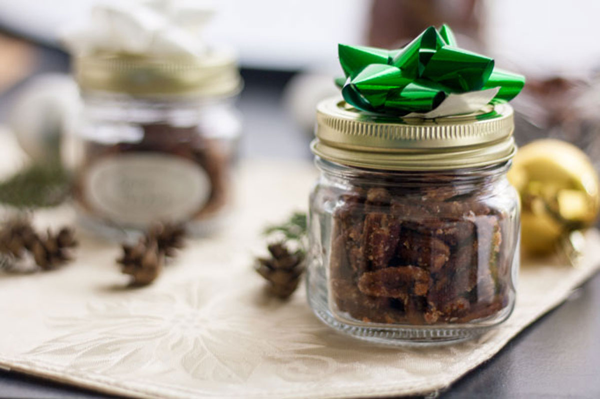Spicy nuts in jars decorated for gifting.