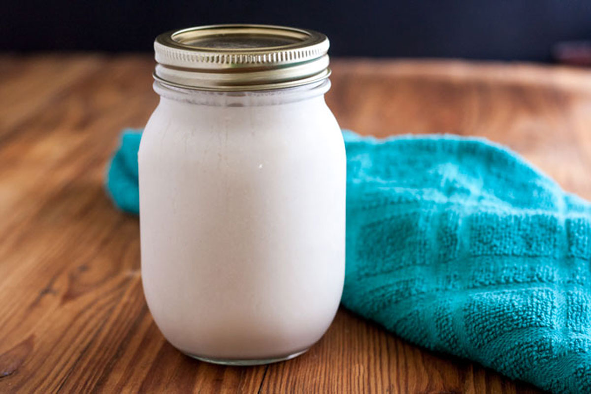 Mason filled with evaporated milk substitute