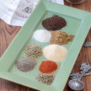 Easy Taco Seasoning spices arranged on green plate