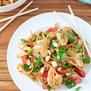 shrimp pad thai on white plate
