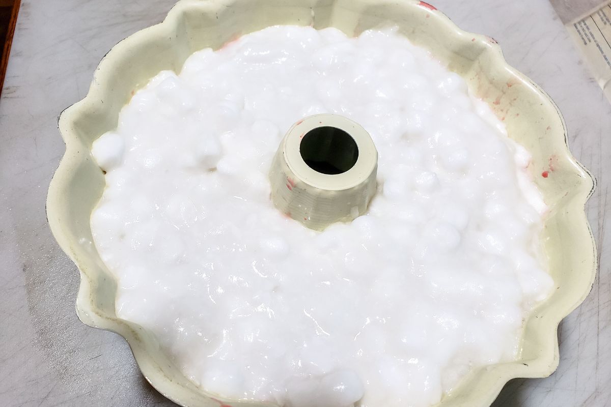 Marshmallow/gelatin mixture added to The mold.