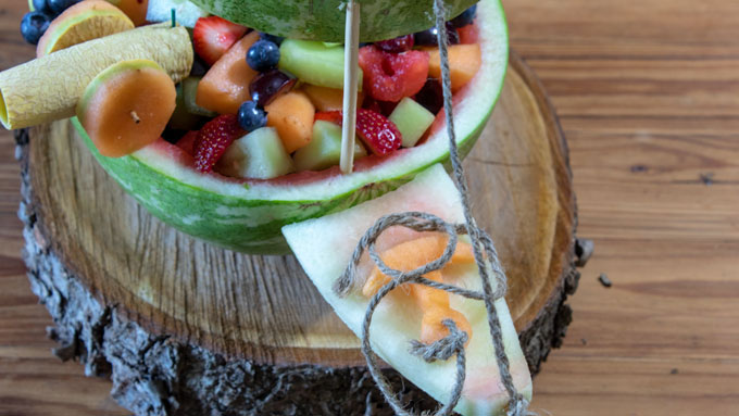 Closeup of anchor carved from cantaloupe