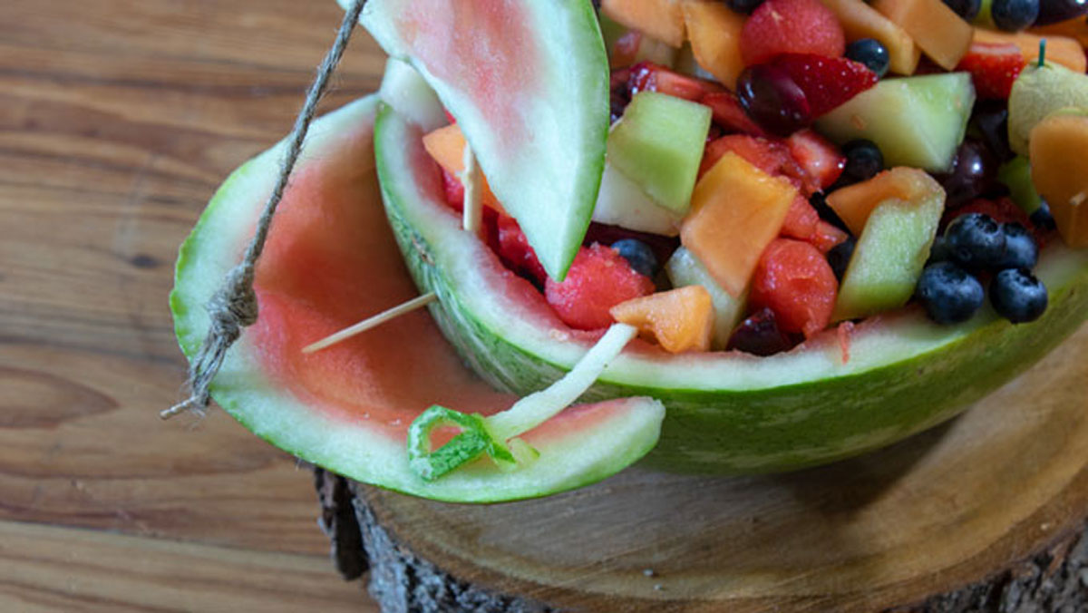 Close up of carved sword made from watermelon
