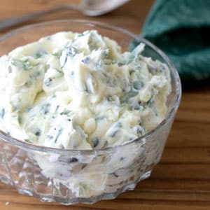 garlic scape butter in glass bowl