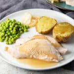 Turkey breast with gravy, peas and potatoes