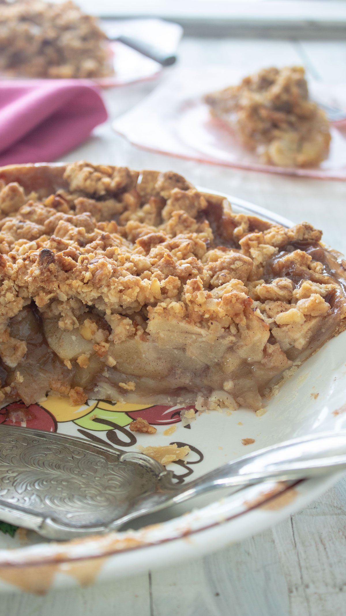 Apple filling inside of cut pie.