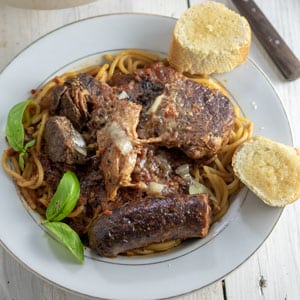 meaty pasta on white plate