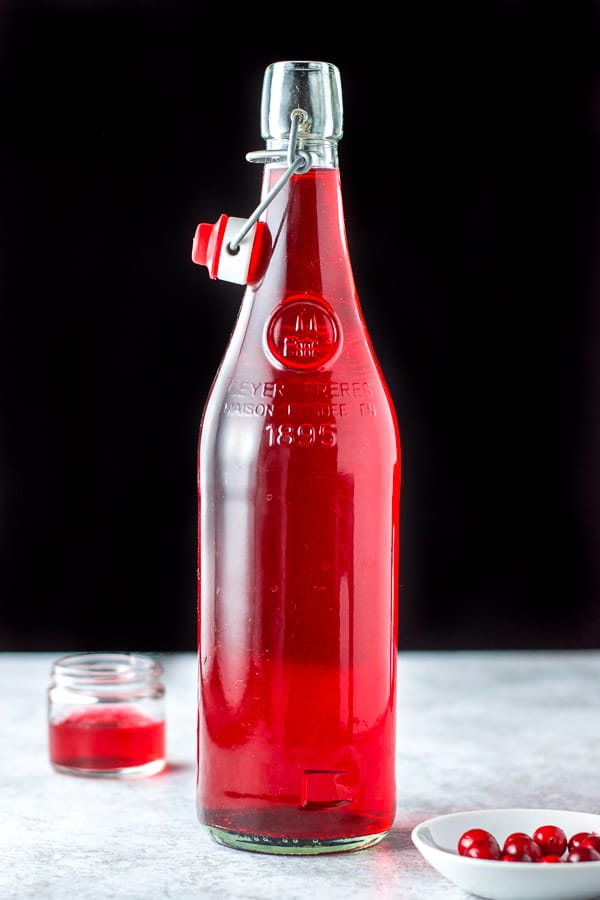 carafe of cranberry infused vodka