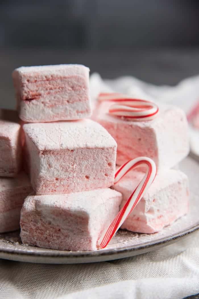 peppermint marshmallows piled on a white plate