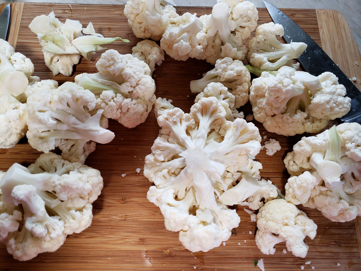 Cauliflower head cut into florets.