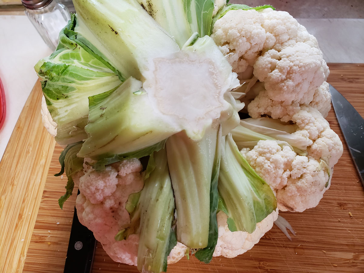 Some of the leaves removed from the inside of the cauliflower core.