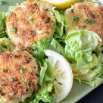 carb cakes on bed of lettuce with lemons