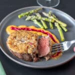 horseradish crusted beef filet on gray plate
