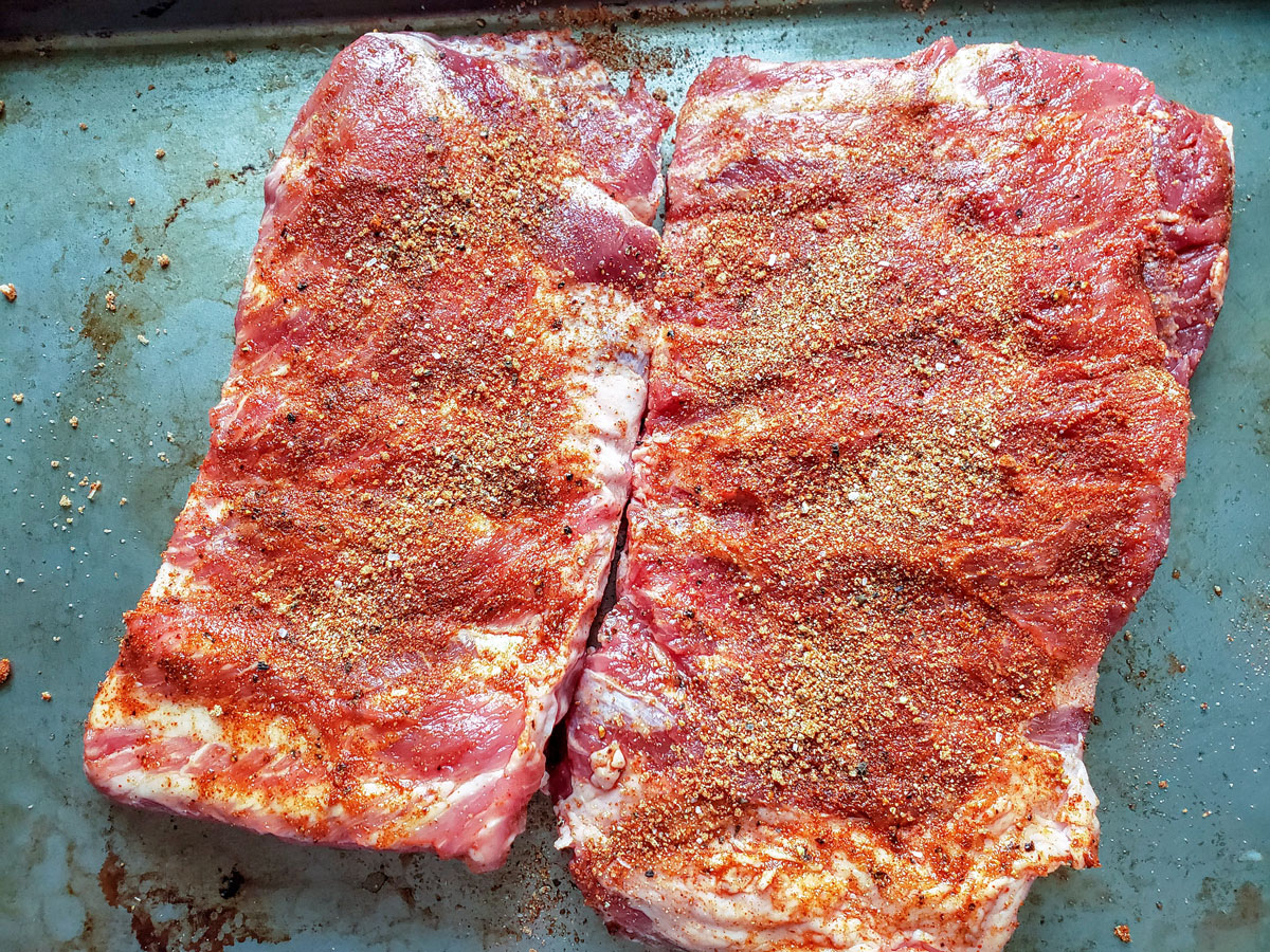 Liberally rub the pork on both sides with the rub.