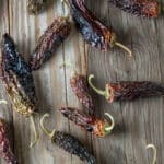 smoked chipotles on barnwood