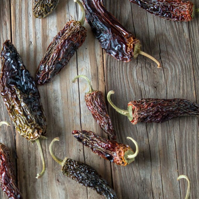 smoked chipotles on barnwood