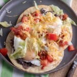 2 Chorizo Huevos Rancheros on grey plate.