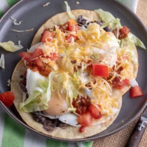 2 Chorizo Huevos Rancheros on grey plate.