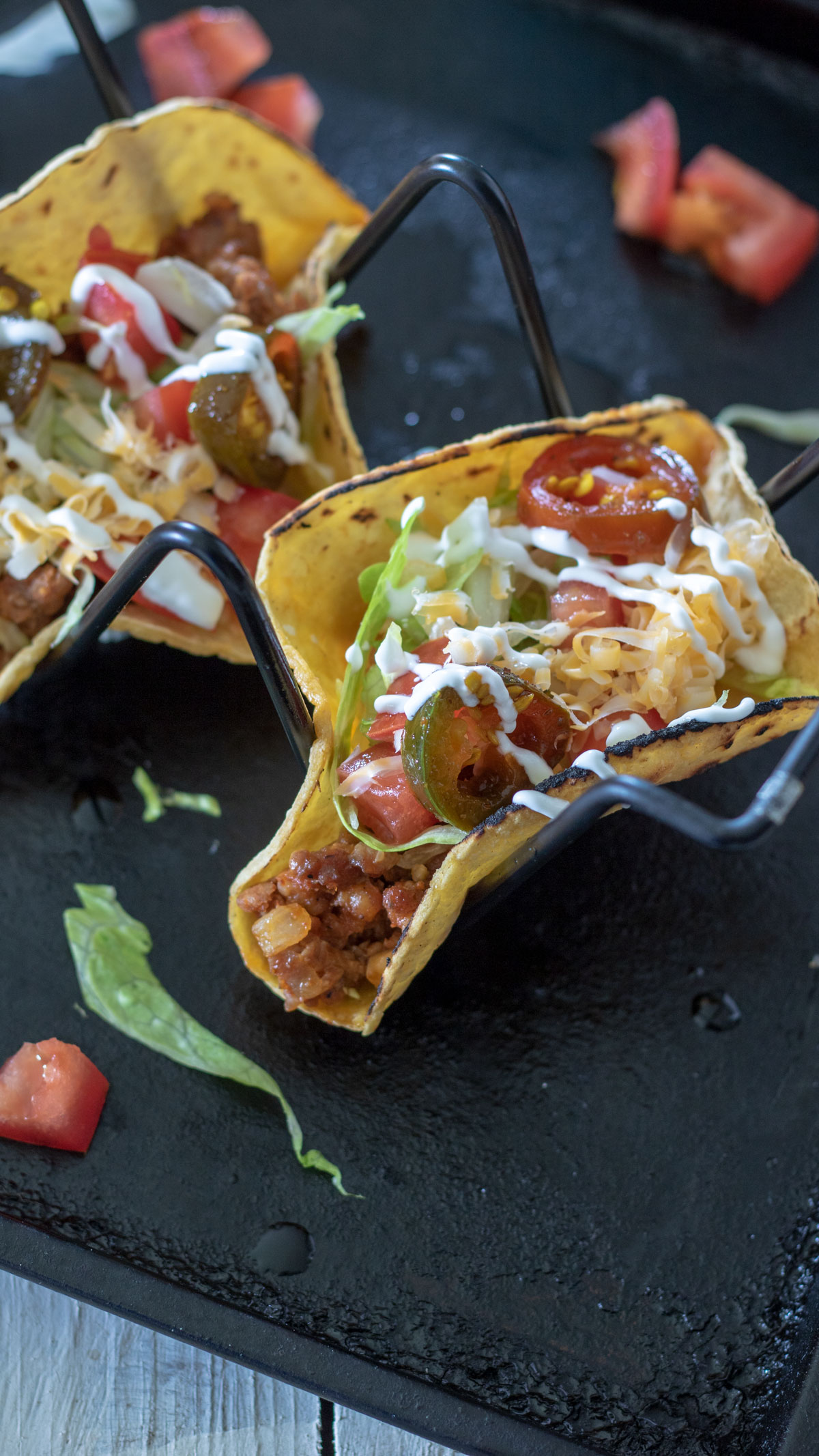 Chrizo tacos in taco stand.