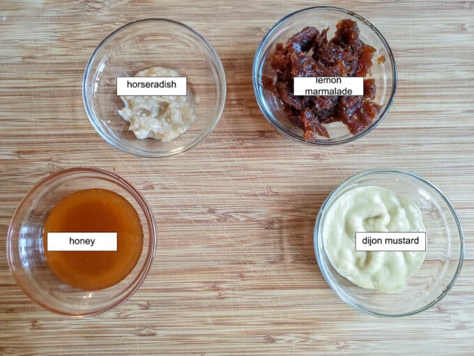 Ingredients for sauce. horseradish, lemon marmalade, dijon mustard, honey.