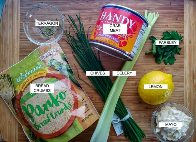 Ingredients for crab cakes panko, tarragon, crab, chives, celery, parsley, lemon, mayo