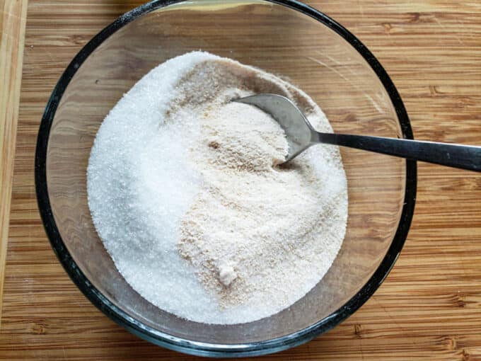 Pectin and sugar added to bowl.
