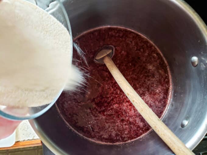 Adding pectin to pot.
