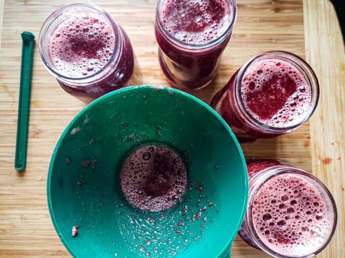 Cannel funnel with jars filled with jam.
