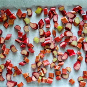 Chopped rhubarb on parchment paper.