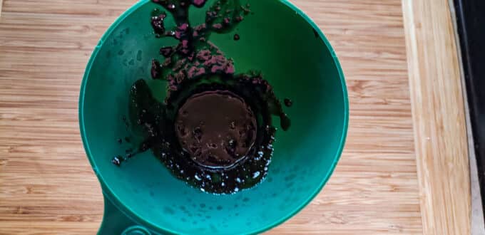 Sauce added to jar with funnel.