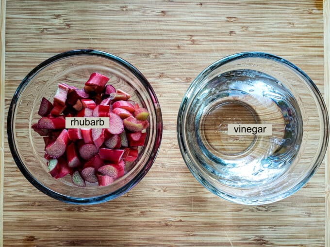 Ingredients for rhubarb vinegar;  white vinegar and rhubarb.