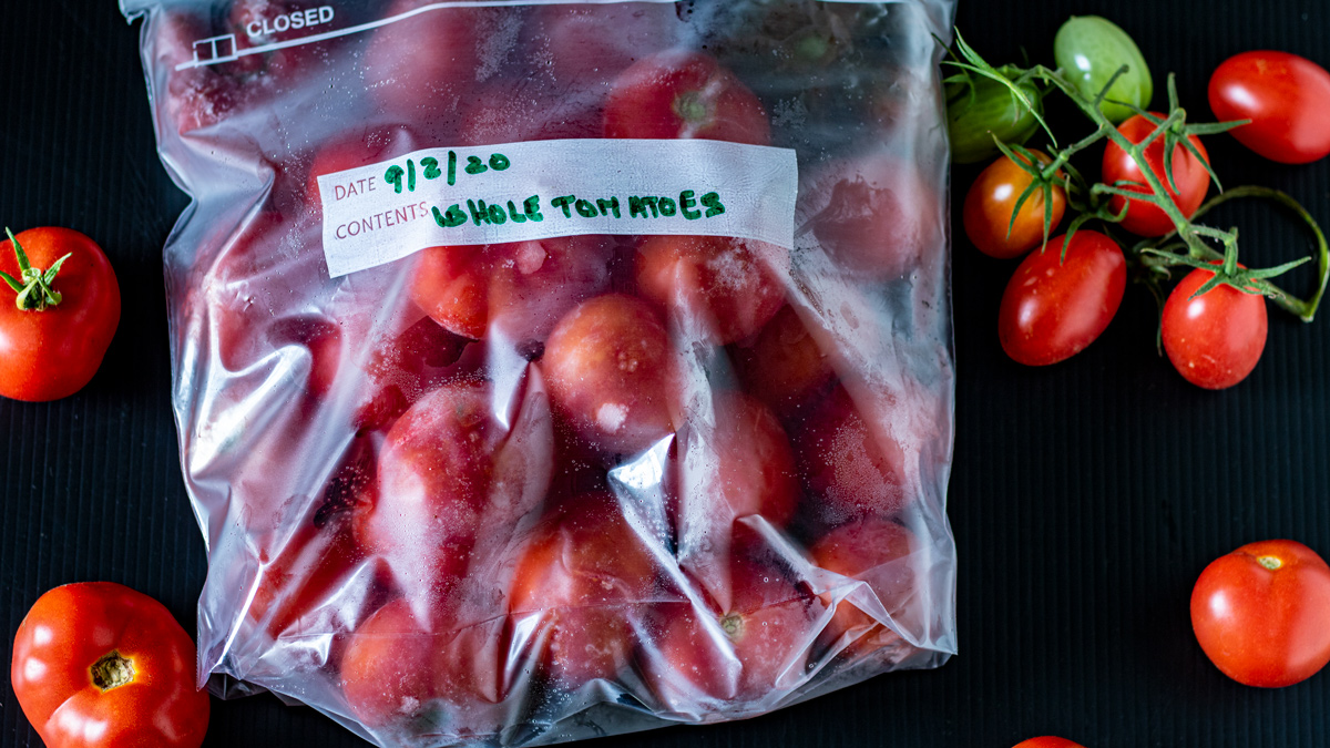 Whole tomatoes in freezer bags.