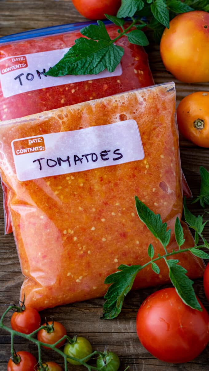Crushed tomatoes in freezer bags.