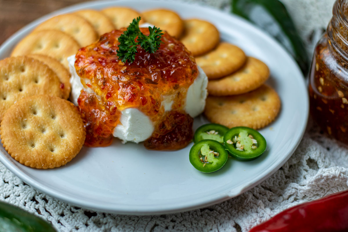 Holiday appetizer plate with sliced jalapenos.