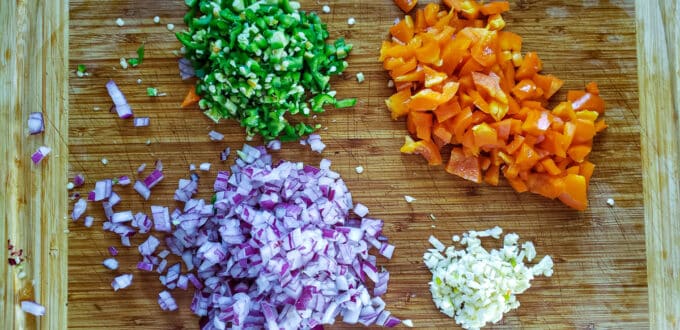 chopped vegetables on cutting board.
