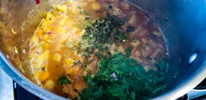 Herbs added to pot.