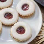 Close up of cookies on white plates.