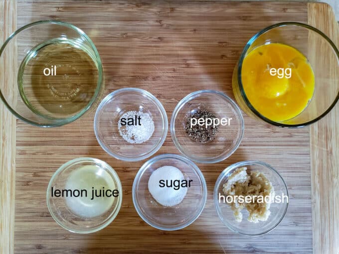 Ingredients for sauce egg, oil, salt, pepper, lemon juice, sugar, horseradish.
