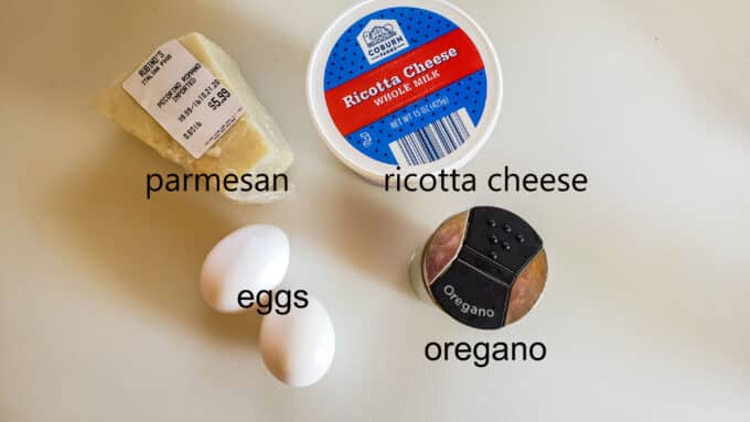 Ingredients for filling; parmesan, ricotta, eggs, oregano.
