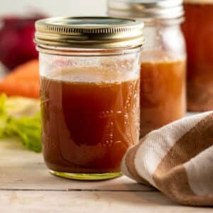 Clarified venison stock in jars