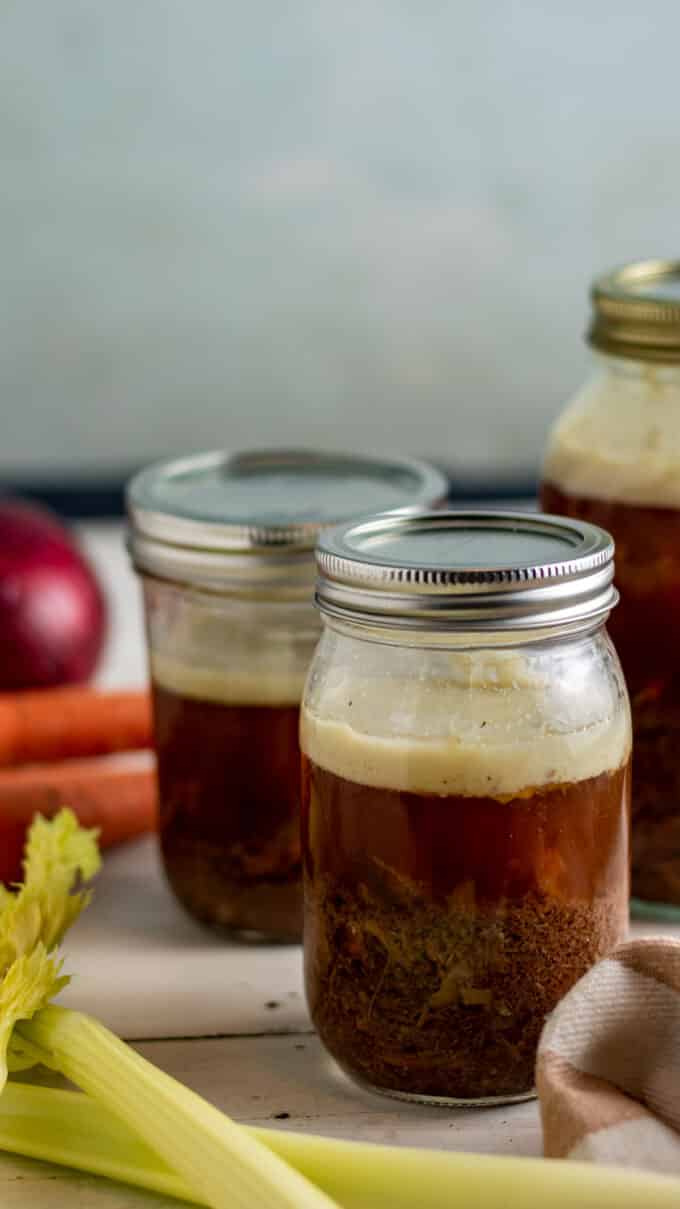 Close up of jars of stock.