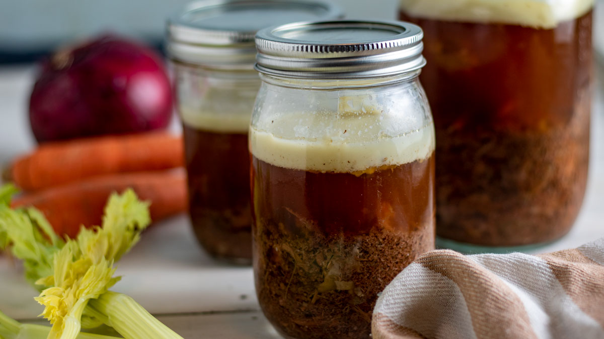 Bone broth in jars with lots of meat.