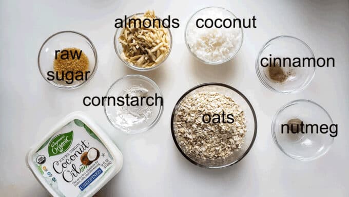 Ingredients for topping; coconut oil, sugar, cornstarch, almonds, coconut, cinnamon, nutmeg, oats.
