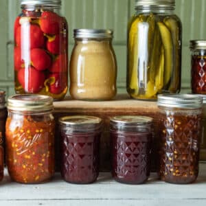 Colorful jars of canned vegetables and fruits.
